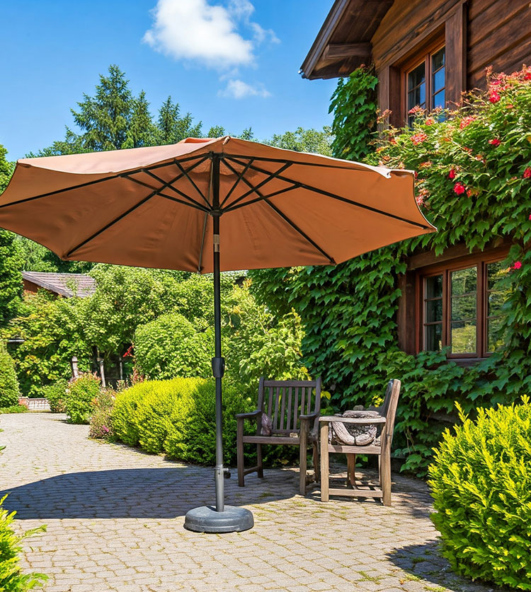Large outdoor patio umbrella providing shade over garden seating area with lush greenery and landscaping